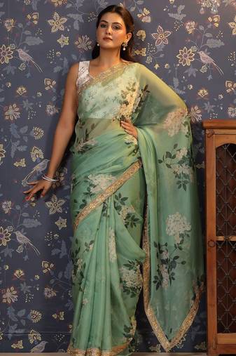 Sea green floral printed embroidered organza saree