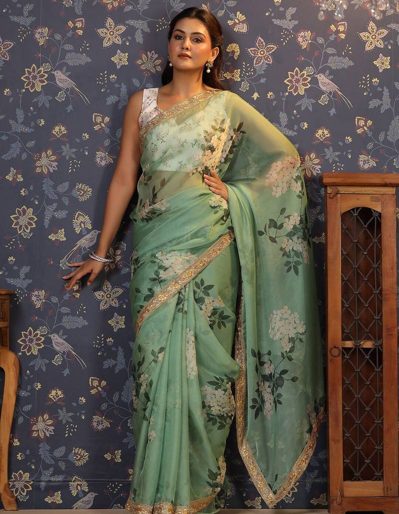 Sea green floral printed embroidered organza saree
