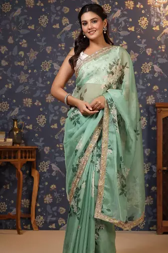 Sea green floral printed embroidered organza saree