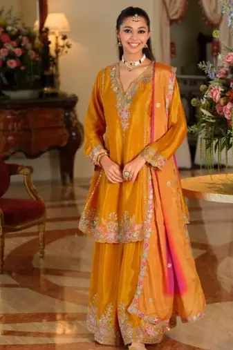 Saffron yellow chinon full stitched free size wedding size upto 44