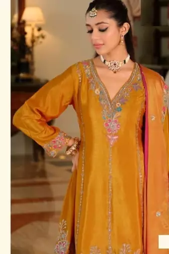 Saffron yellow chinon full stitched free size wedding size upto 44
