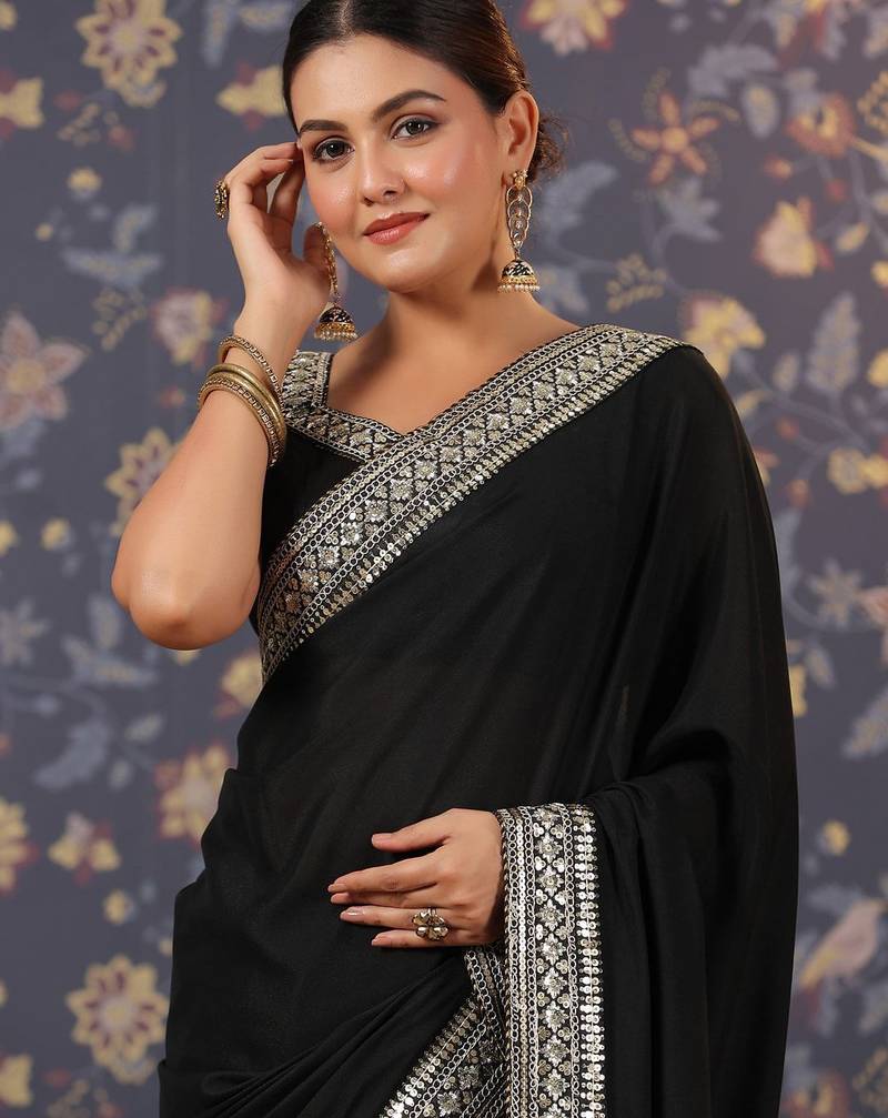 Black embellished pure georgette sarees
