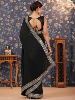 Black embellished pure georgette sarees 4