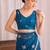 Teal embroidered tissue designer saree