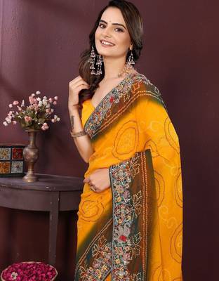 Yellow bandhani printed georgette saree with unstitched blouse 1