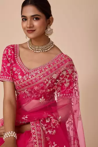 Pink embroidered saree with blouse piece