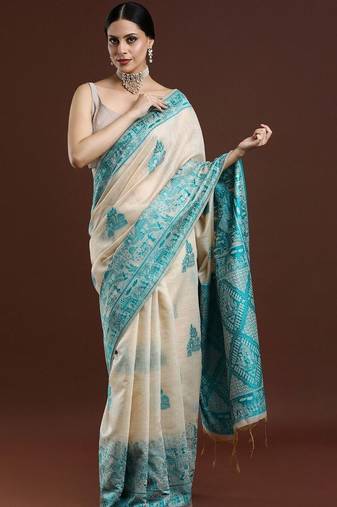 Beige woven design saree with blouse