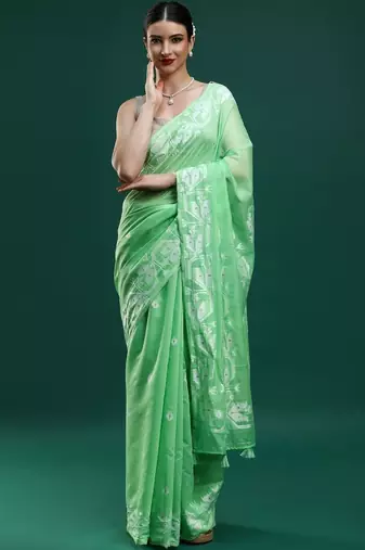 Green woven design muga sarees with blouse piece