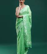 Green woven design muga sarees with blouse piece