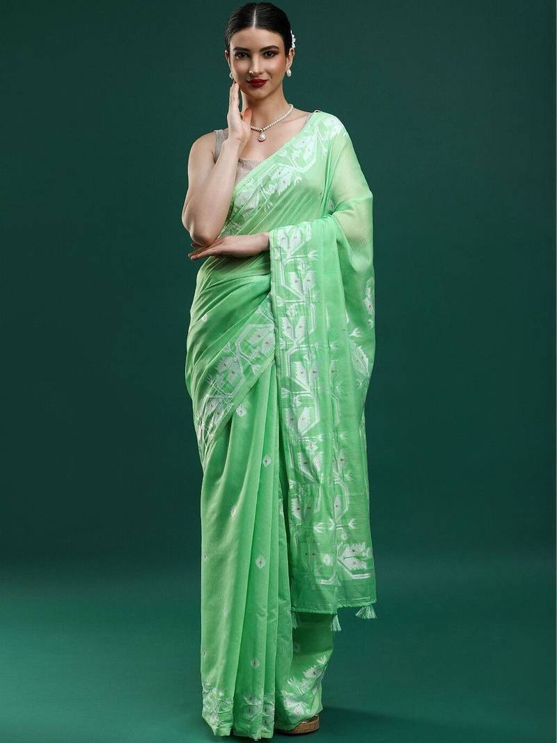Green woven design muga sarees with blouse piece