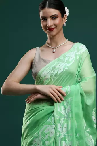 Green woven design muga sarees with blouse piece
