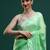 Green woven design muga sarees with blouse piece