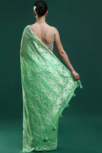 Green woven design muga sarees with blouse piece