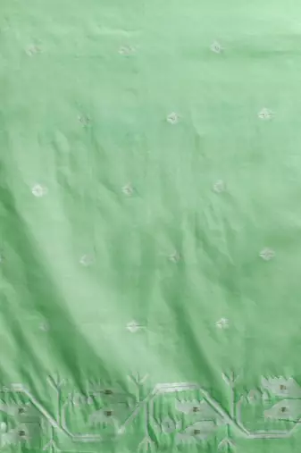Green woven design muga sarees with blouse piece