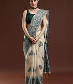 Beige woven design saree with blouse