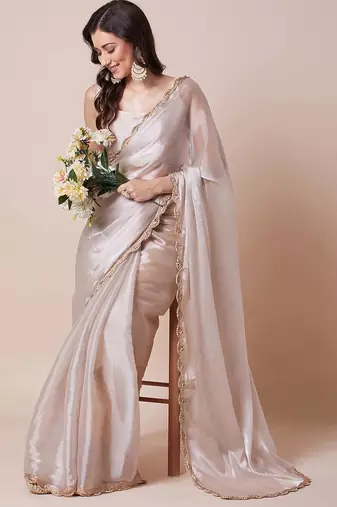 Cream embellished border organza saree with unstitched blouse