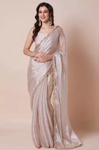 Cream embellished border organza saree with unstitched blouse