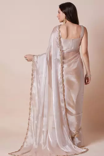 Cream embellished border organza saree with unstitched blouse