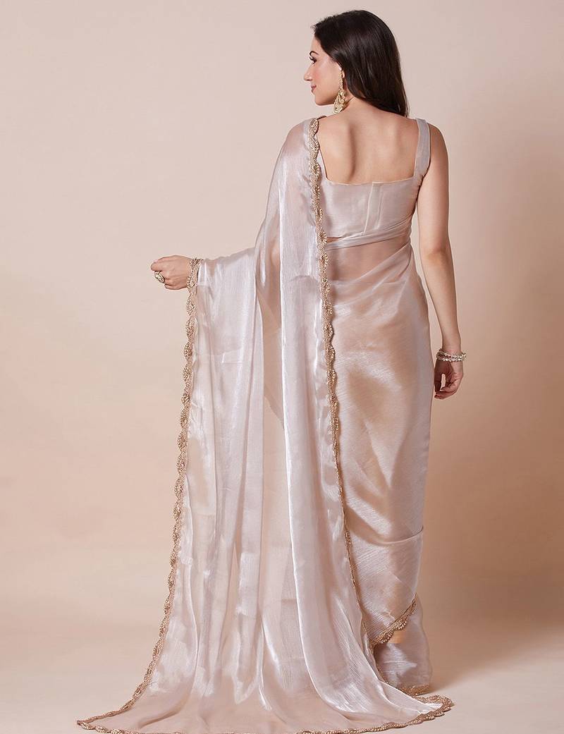 Cream embellished border organza saree with unstitched blouse
