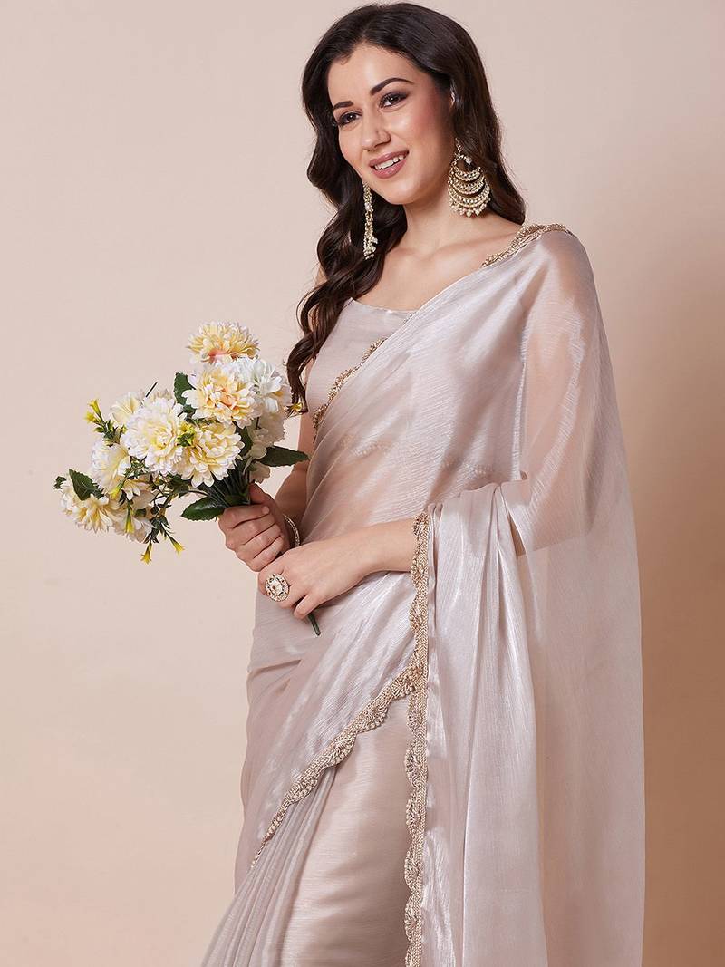Cream embellished border organza saree with unstitched blouse