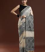 Beige woven design saree with blouse