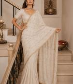 Off white floral sequinned satin saree