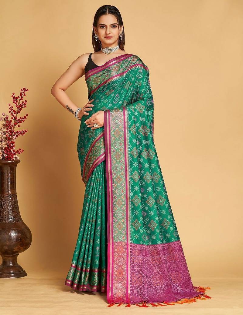 Green woven design patola art silk saree with blouse piece
