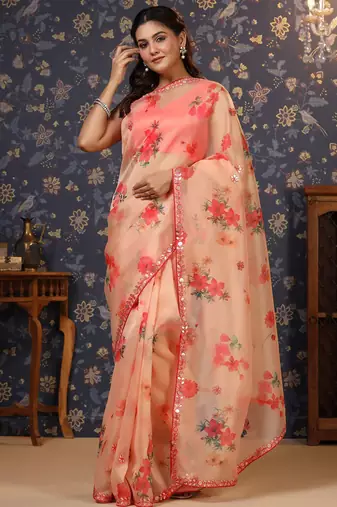 Peach floral printed organza embellished border saree