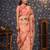 Peach floral printed organza embellished border saree