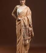 Beige woven design saree with blouse