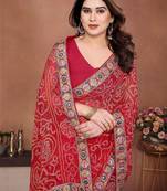 Red embroidered sarees with blouse piece