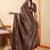 Brown ethnic motifs digital printed silk blend saree with unstitched blouse