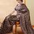 Brown ethnic motifs digital printed silk blend saree with unstitched blouse