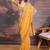 Yellow bandhani design embroidered saree with blouse piece