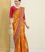 Mustard mustard yellow & red floral zari silk blend banarasi saree