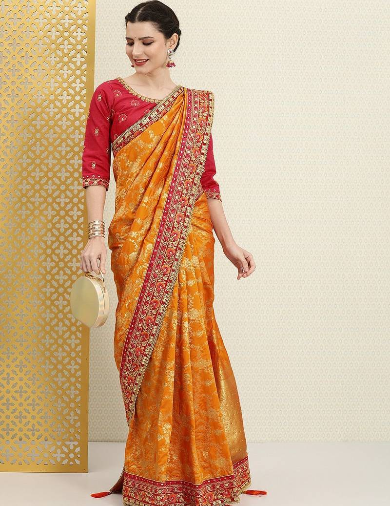Mustard mustard yellow & red floral zari silk blend banarasi saree