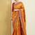Mustard mustard yellow & red floral zari silk blend banarasi saree