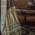 Green ethnic motifs printed zari banarasi saree