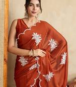 Rust embroidered saree with blouse piece