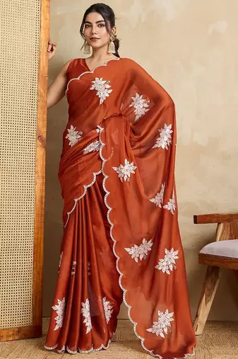 Rust embroidered saree with blouse piece