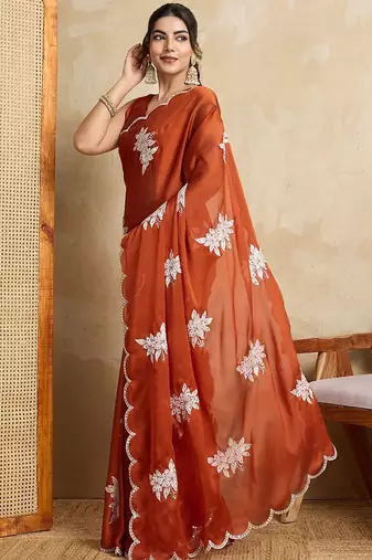 Rust embroidered saree with blouse piece