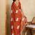 Rust embroidered saree with blouse piece