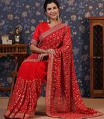 Red embroidered pure georgette heavy work saree