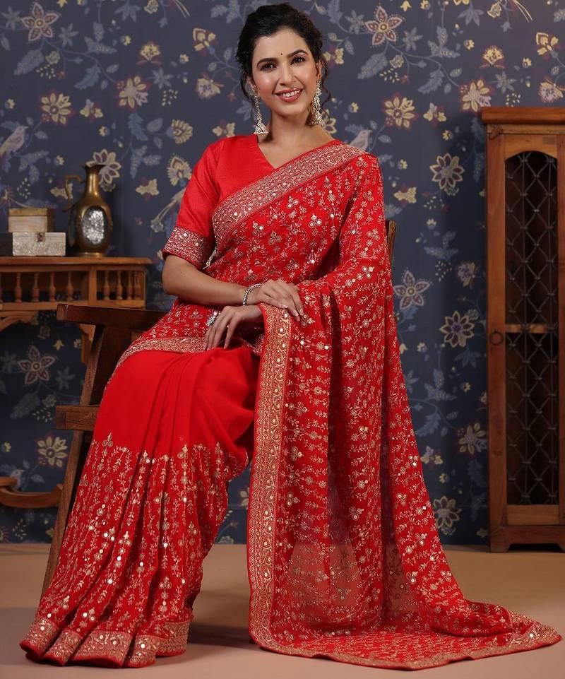 Red embroidered pure georgette heavy work saree