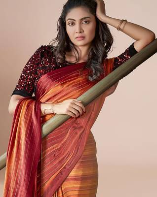 Rust striped poly georgette solid party wear saree 4