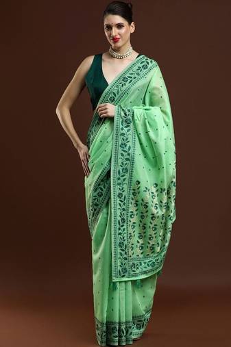 Green woven design saree with blouse