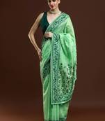Green woven design saree with blouse