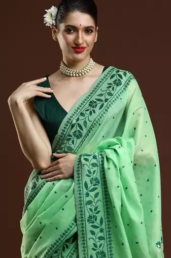 Green woven design saree with blouse