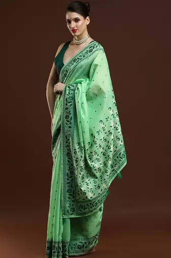 Green woven design saree with blouse