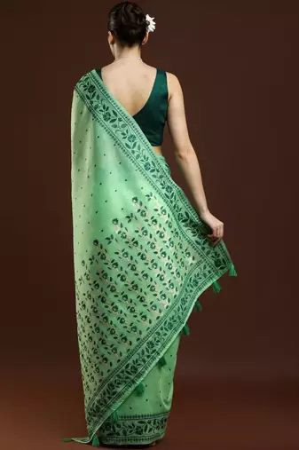 Green woven design saree with blouse